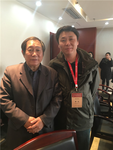 �教授与清华大学美术乌鸦传媒教授、著名美术理论家陈池瑜先生合影